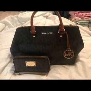 Brown Michael Kors purse and wallet